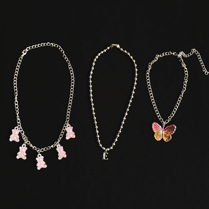 StrangeLab 3-Piece Necklace Set | Candy Bear Y2K Necklace | Iridescent Butterfly Letter Necklace necklace strangelab