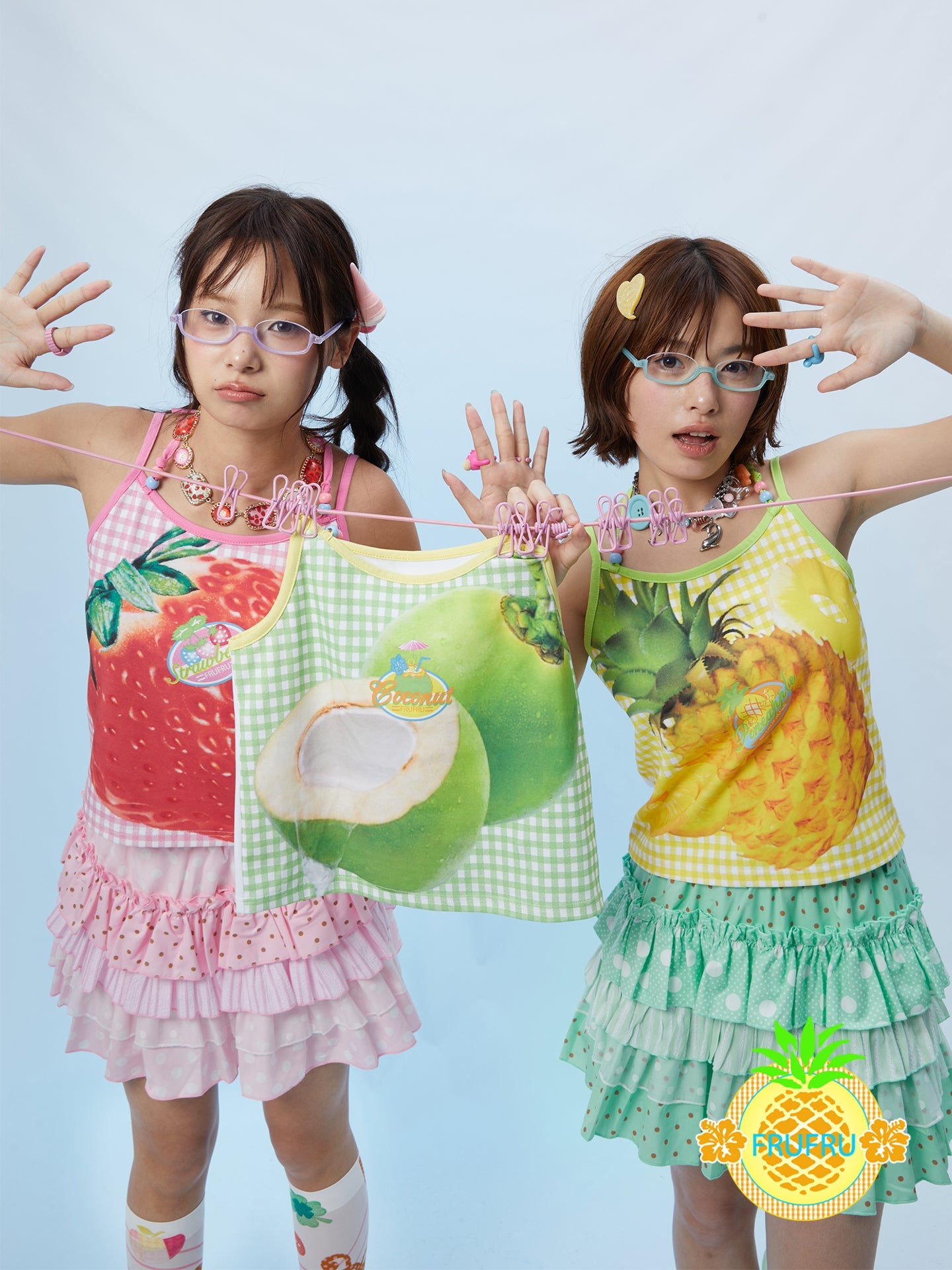 FruFru collection featuring Y2K-inspired clothing with cute and retro designs. Skirts, pants, dresses, and shirts blended with unique fabrics and playful illustrations, capturing the fun and playful essence of 'Oh, I’m so cute.