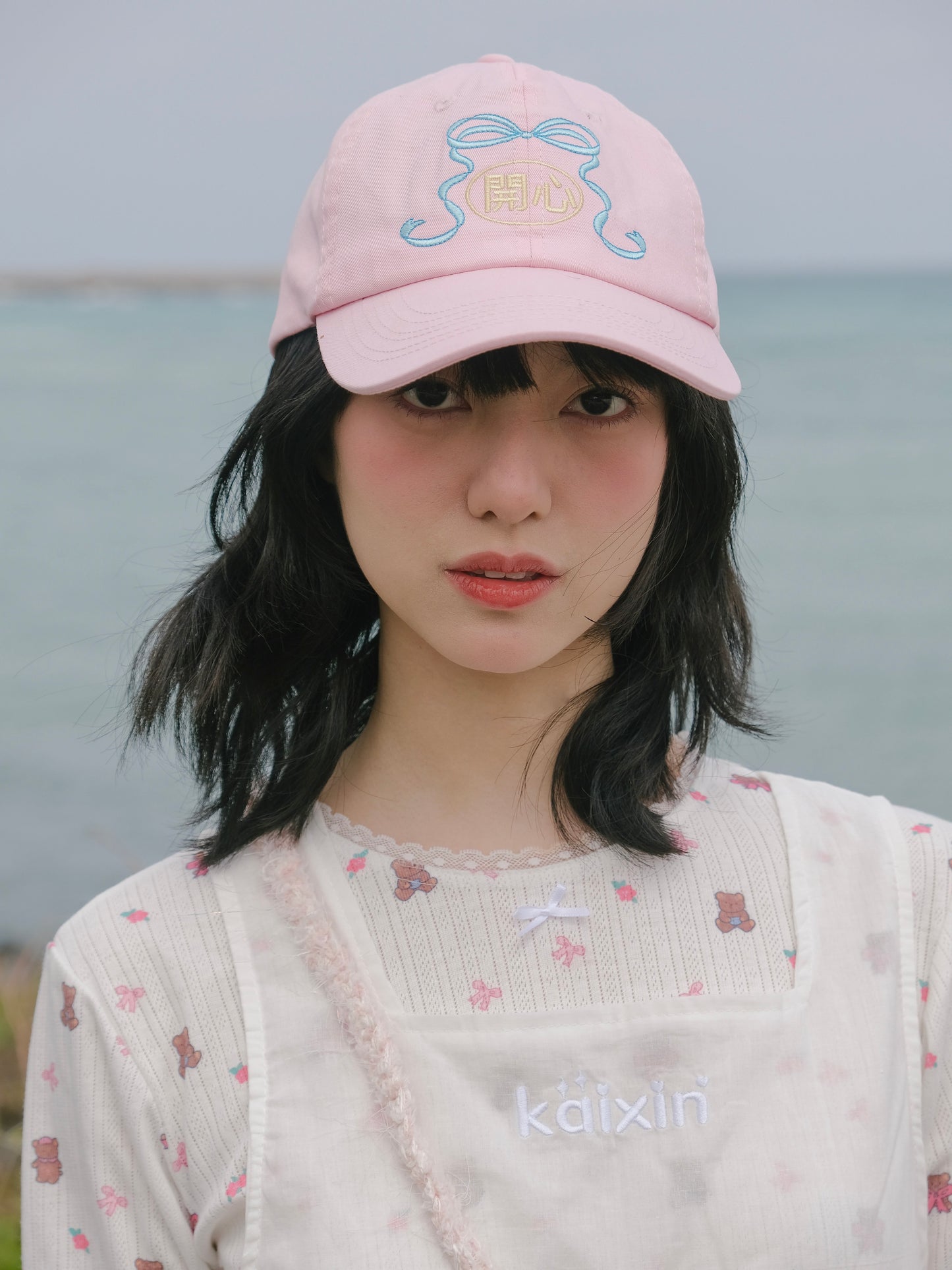 Harajuku-style pink embroidered sun hat with happy message and heart-shaped buckle