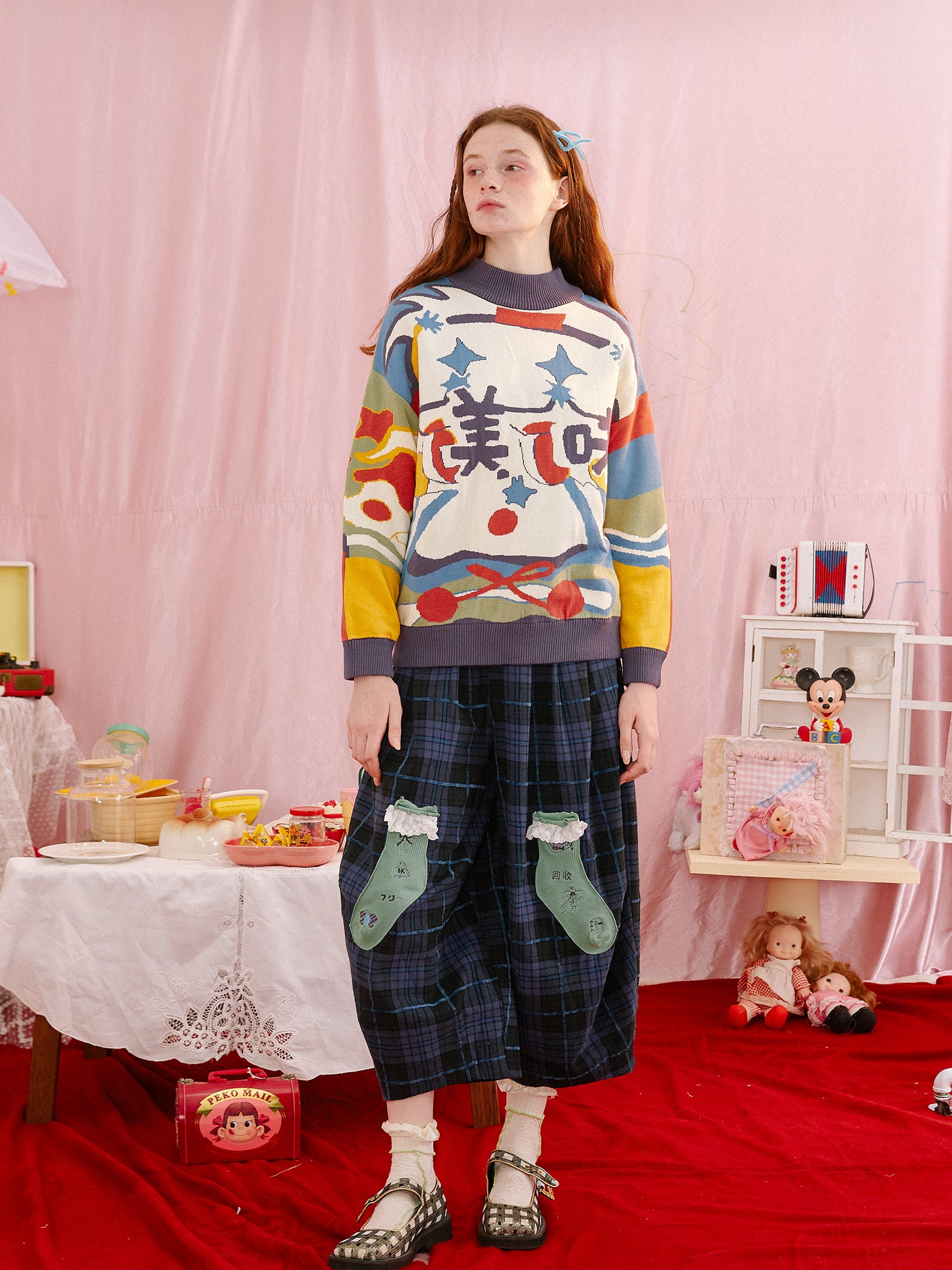 Harajuku-style HELPHELP reversible purple sweater featuring colorful food illustrations for a fun and cozy look.