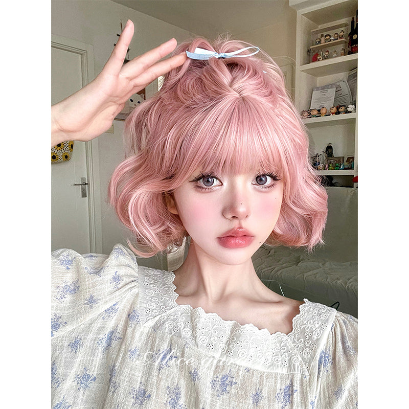 Alice Garden Harajuku pink wig featuring sweet pastel pink short curly hair, perfect for achieving a cute kawaii style.