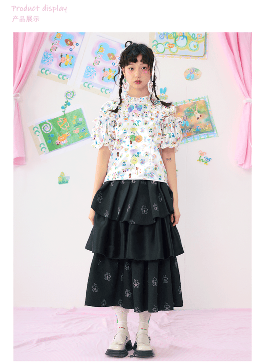 HELPHELP Alien Club satin blouse with a colorful print and cropped puff sleeves, a stylish and playful addition to any wardrobe.