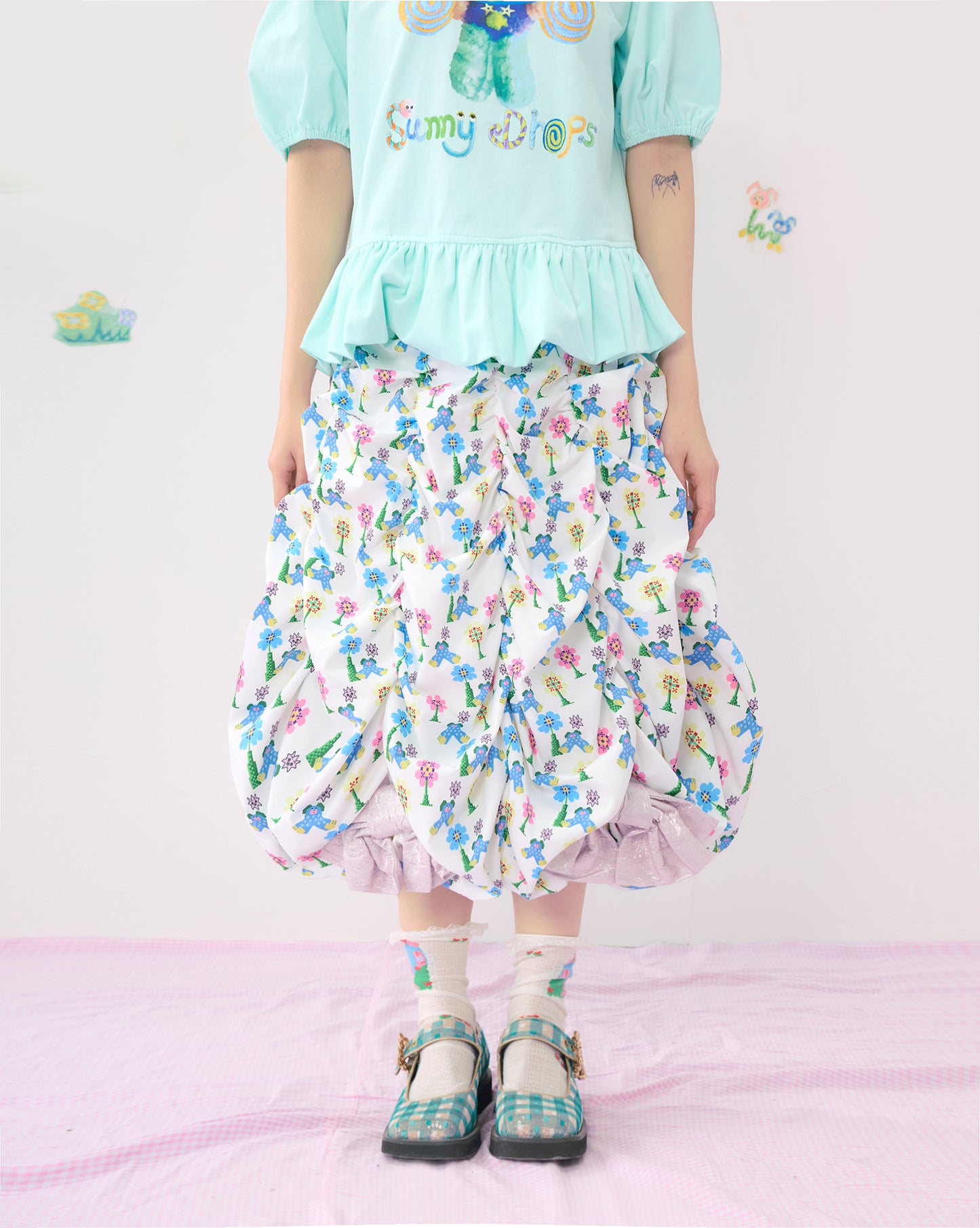 HelpHelp floral ruffled layered oversized skirt with a metal bow, perfect for a cute and elegant look.