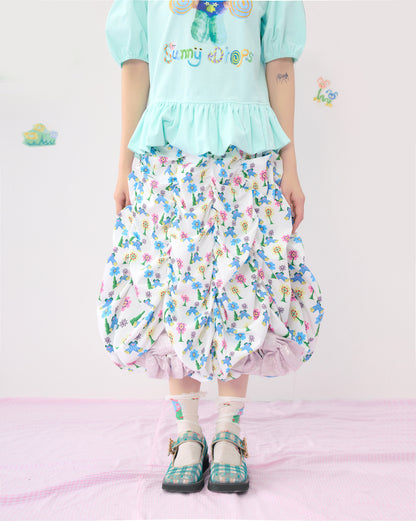 HelpHelp floral ruffled layered oversized skirt with a metal bow, perfect for a cute and elegant look.