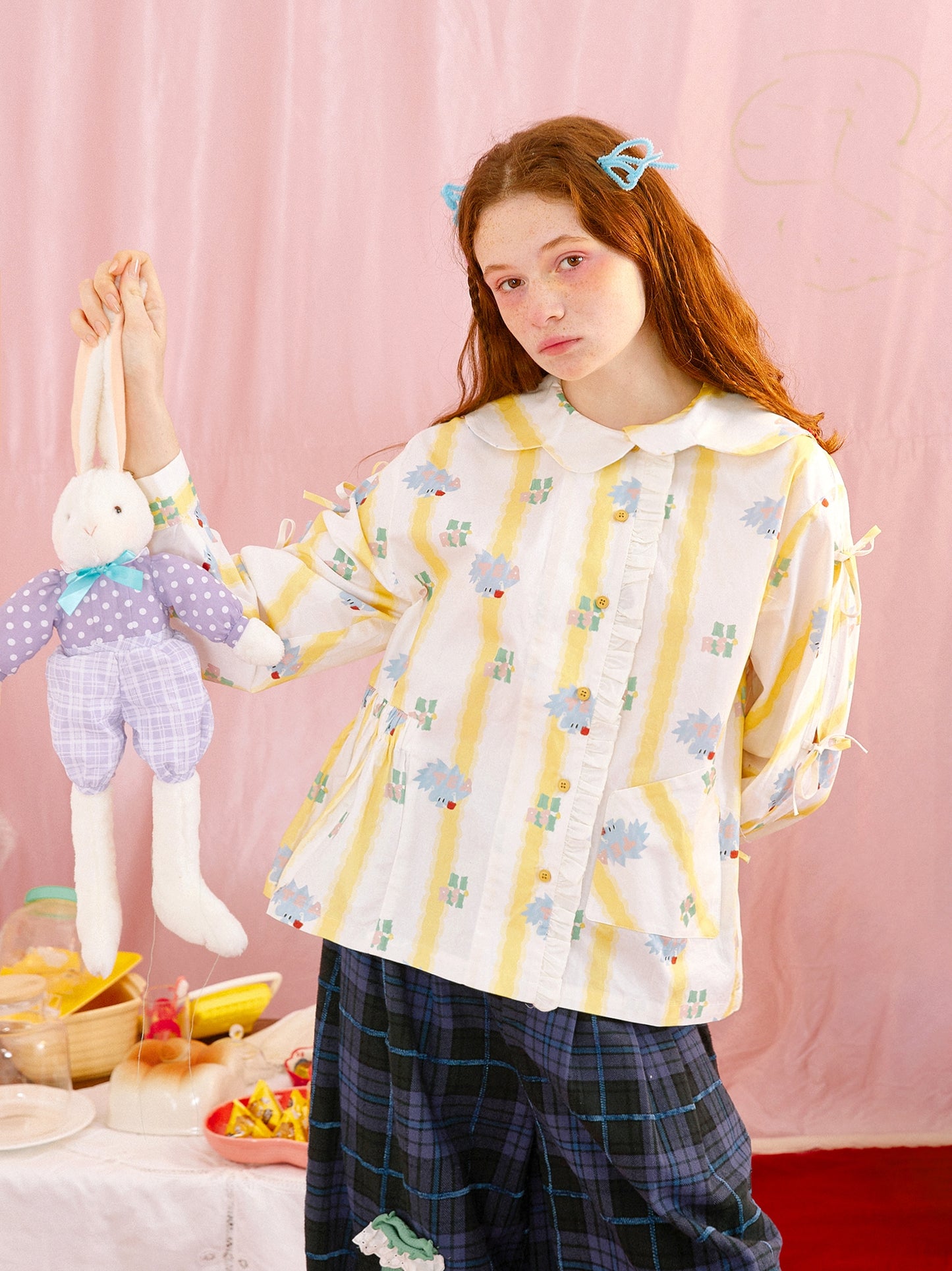 Harajuku-style HELPHELP yellow striped bow shirt with an irregular collar and unique illustration print.