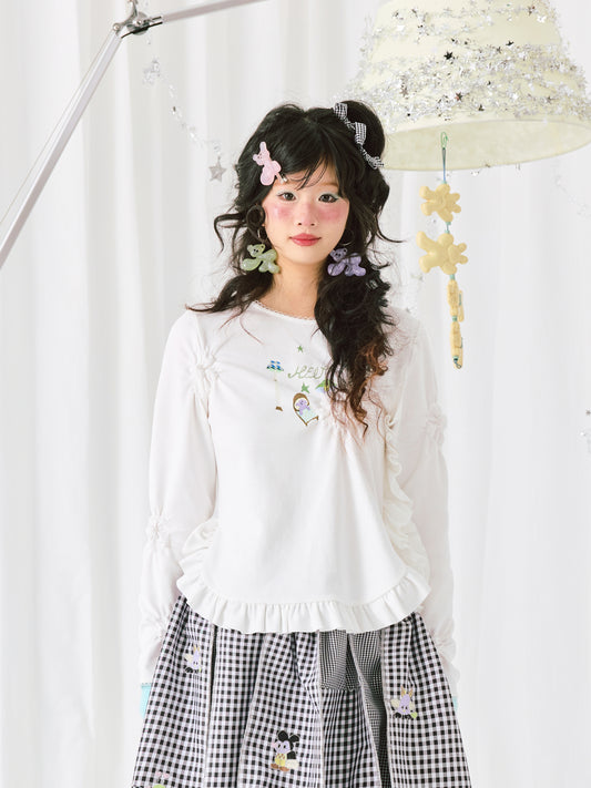 Harajuku-style HELPHELP white cotton long sleeve t-shirt with ruffled lace and colorful graffiti print for a playful, artistic look.