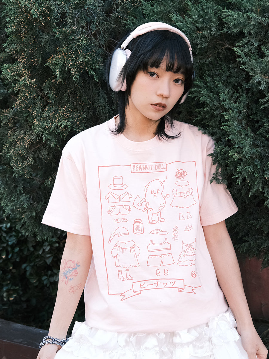 Meugler Circus Harajuku-style pink cotton T-shirt featuring a cute cartoon peanut costume change design for a fun and playful look.