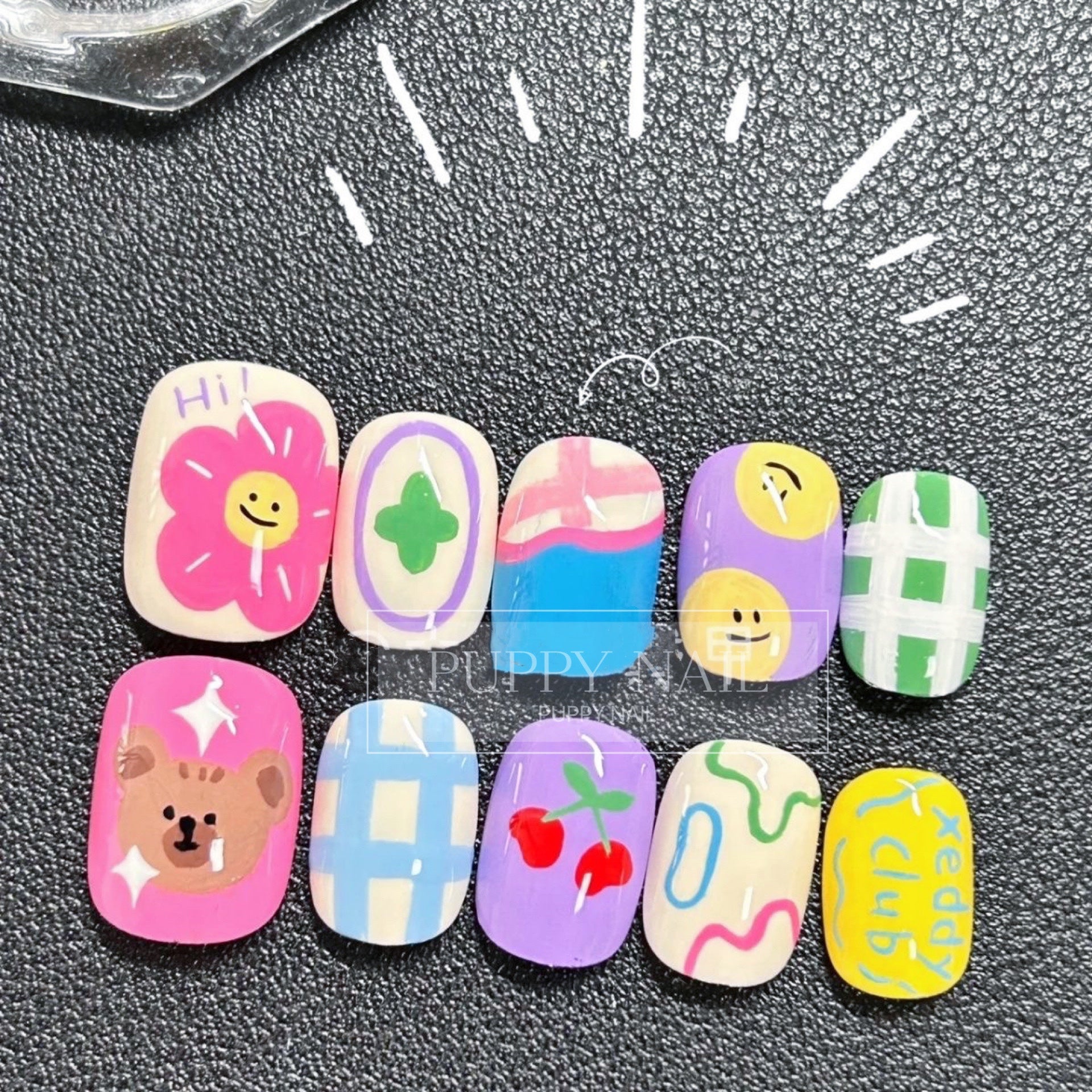 Harajuku-style Puppy bear party graffiti hand-painted nail art with cute Thai summer cartoon designs, featuring playful bears and vibrant colors for a fun and cheerful look.